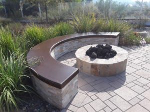 outdoor pavers flooring and flagstone bench and fire pit installation