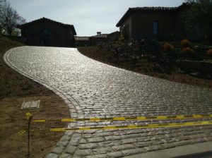 paver sealing long driveway