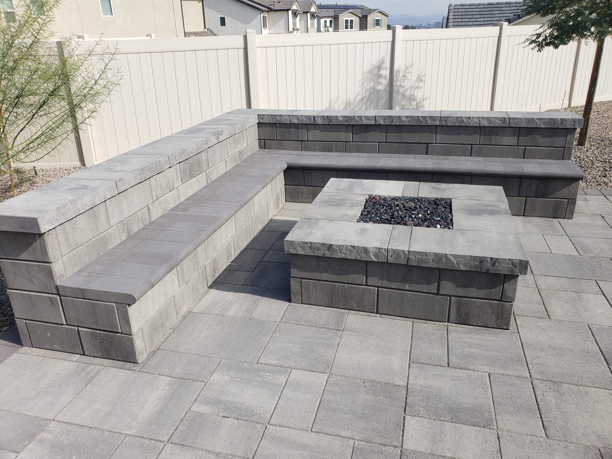 pavers installation, includes firepit, bench and a new pavers flooring