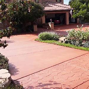 restoration of flat and stamped concrete driveway