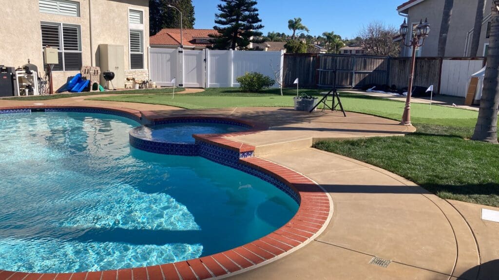 alt="pool deck concrete resurfacing, restoration, staining and sealing"