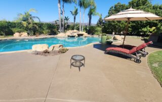 alt="decorative concrete pool deck installation"